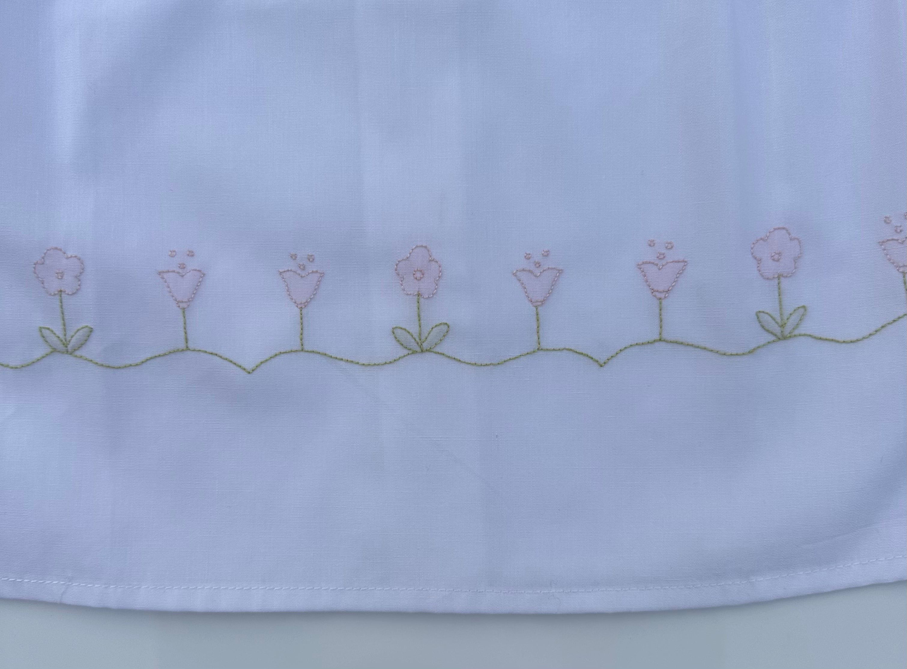 Daygown with dainty flowers embroidered on the bottom