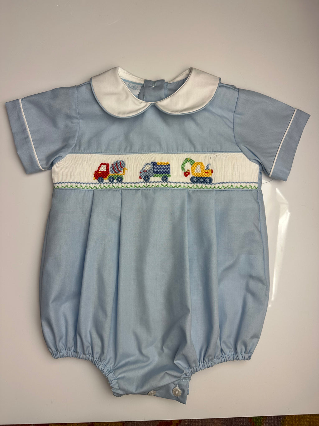 Boys Trucks Smocked on Lt. Blue poplin Bubble