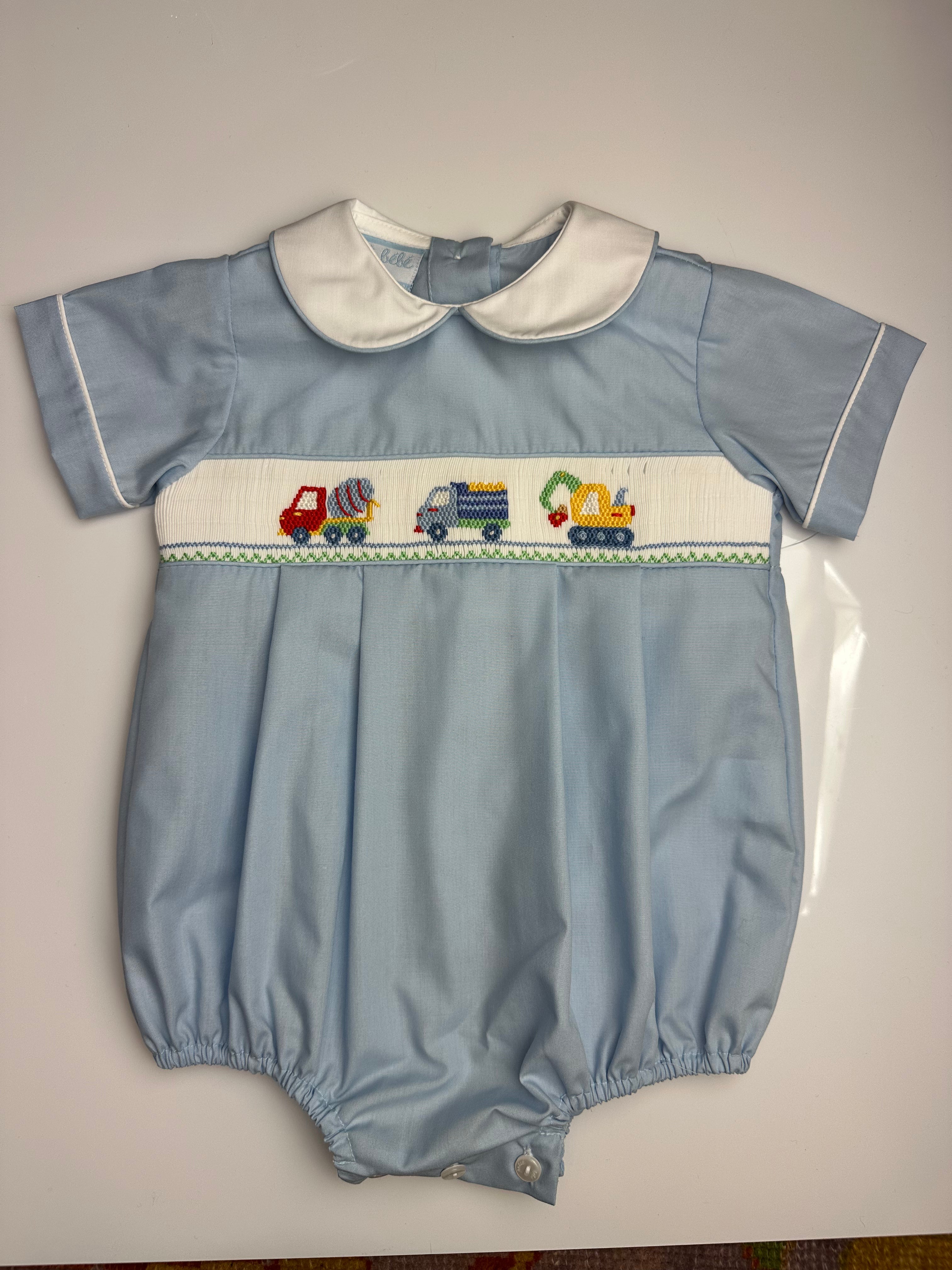 Boys Trucks Smocked on Lt. Blue poplin Bubble